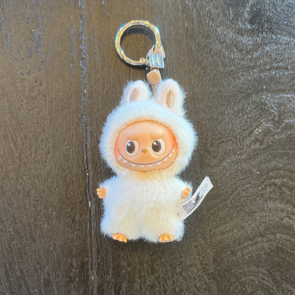 New mini labubu with H charm and H on his backside keychain.